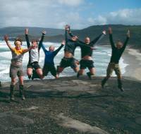 Happy group of trekkers on the South Coast Track |  <i>Anne Jordan</i>
