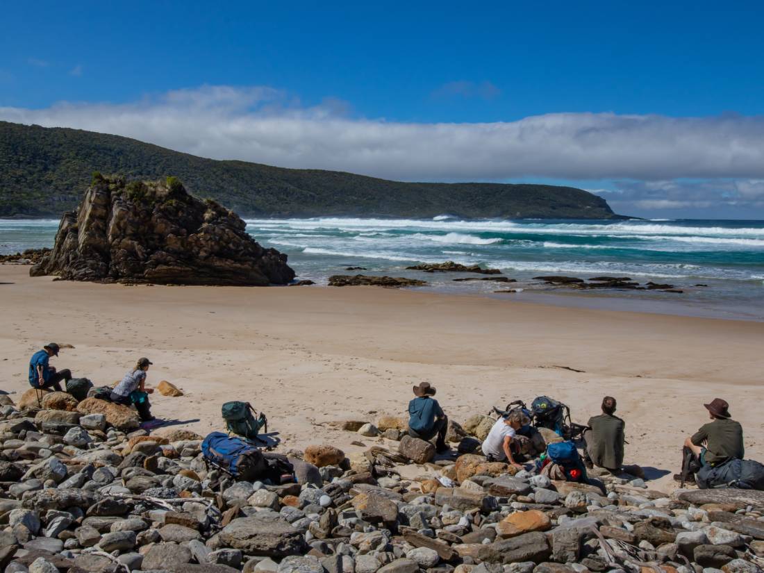 Taking a break on the rugged coastline of the South Coast Track |  <i>John Dalton</i>