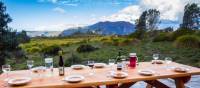 Delicious meals and wine are served each evening on the Cradle Huts walk | Great Walks of Australia