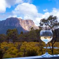 Enjoy a glass of wine after a day's trek along the Overland Track | Great Walks of Australia