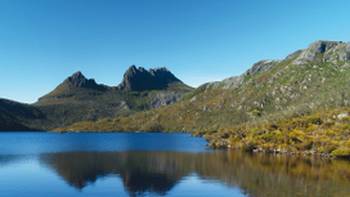 Cradle Mountain and Dove Lake in Tasmania,Istock photos Cradle Mountain is prefectly reflected in Dove Lake, Tasmania