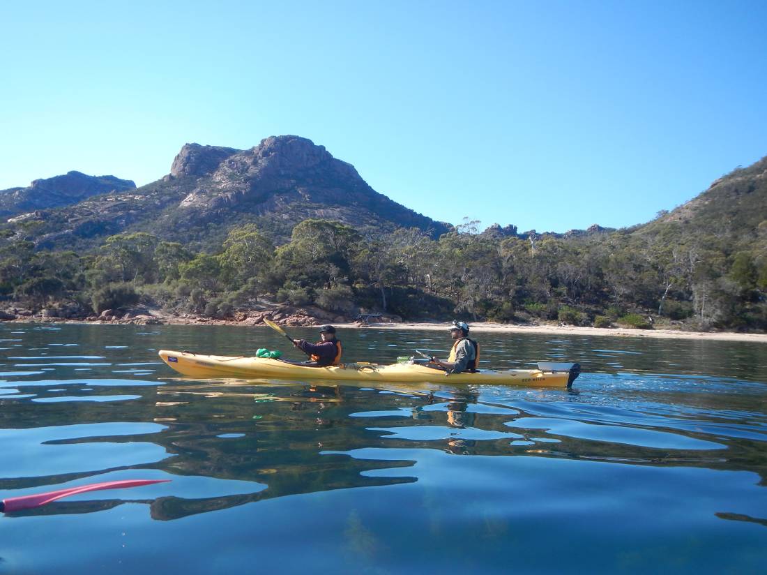 Kayaking on Coles Bay with the Hazards in the distance |  <i>Brian Dodson</i>
