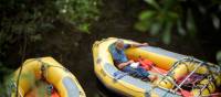 Rafter reading a book in the raft | Glenn Walker