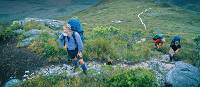 Hiker stops to rest on the South Coast Track | Don Fuchs