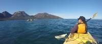 Kayaking on Coles Bay, with the Hazards in the distance | Brad Atwal