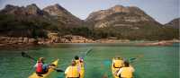 Kayaking the crystal clear waters of the Freycinet Peninsula on Cycle, Kayak and Walk Tasmania