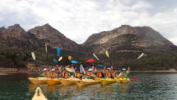 Kayaking in Coles Bay beneath the Hazards