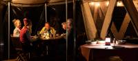 Enjoying dinner at our Eco-Comfort Camp on Flinders Island | Lachlan Gardiner