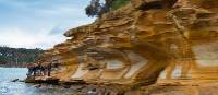 Stunning coloured rocks on the Maria Island walk | Tourism Tasmania and Rob Burnett