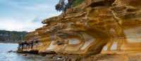 Stunning coloured rocks on the Maria Island walk | Tourism Tasmania and Rob Burnett