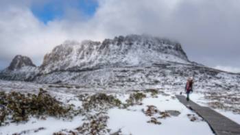 Hiker on the Overland Track in winter