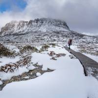 Hiker on the Overland Track in winter | Luke Tscharke