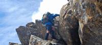 The bushwalks of South West Tasmania often require scrambling over rocky crags | Chris Buykx