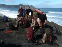 Happy trekkers at the end of the South Coast Track |  <i>Steve Trudgeon</i>