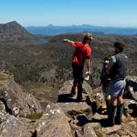 Trekkers enjoying the view with their Tasmanian Expeditions guide from the summit of Mt Jerusalem | Don Fuchs
