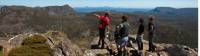 Trekkers enjoying the view with their Tasmanian Expeditions guide from the summit of Mt Jerusalem |  <i>Don Fuchs</i>