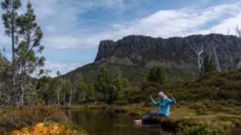 Relaxing by a stream in Walls of Jerusalem National Park. | Benny Plunkett