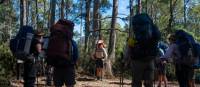 Guide holding a discussion with trekkers in Walls of Jerusalem National Park | Benny Plunkett