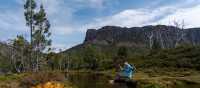 Relaxing by a stream in Walls of Jerusalem National Park. | Benny Plunkett
